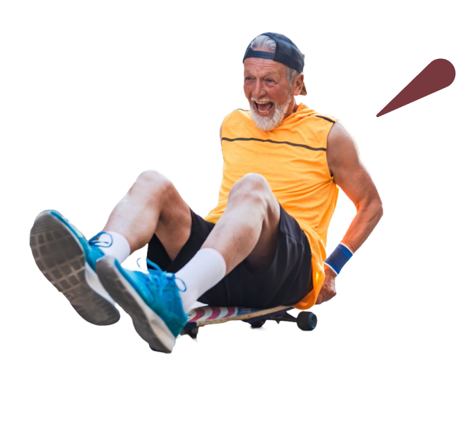 Elderly man on skateboard laughing