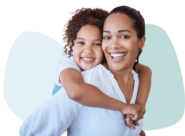 Young mom & daughter smiling